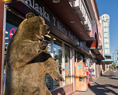 A stuffed bear greets visitors at a shop along 4th Avenue in downtown Anchorage, Alaska.