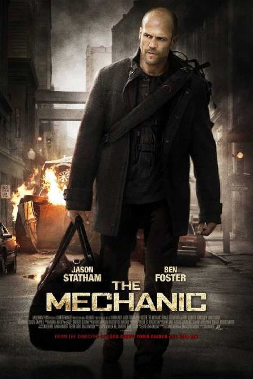 The-Mechanic-2011-Poster-Jason-Statham-Holding-A-Bag.jpg